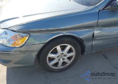 2004 Toyota Avalon Xl z USA, uszkodzony, nr VIN 4T1BF28B34U357059